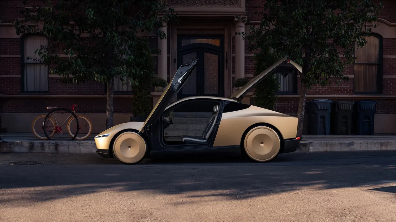 Gold-colored Tesla Cybercab two-seater robotaxi without a steering wheel parked on a city street