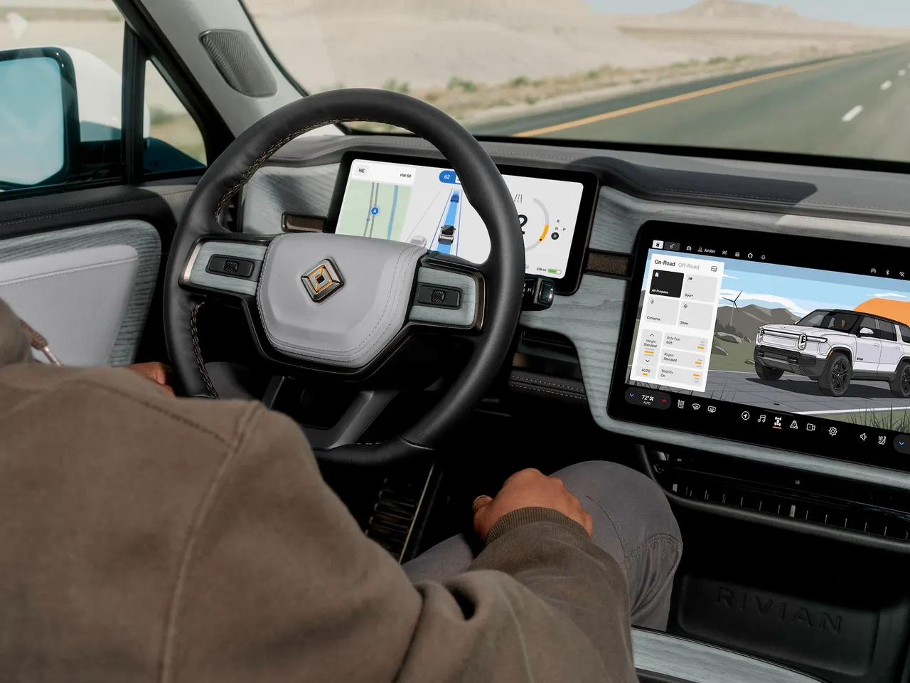A Rivian R2 SUV driving on a city street, overlaid with a digital 3D simulation grid representing a virtual driving environment.