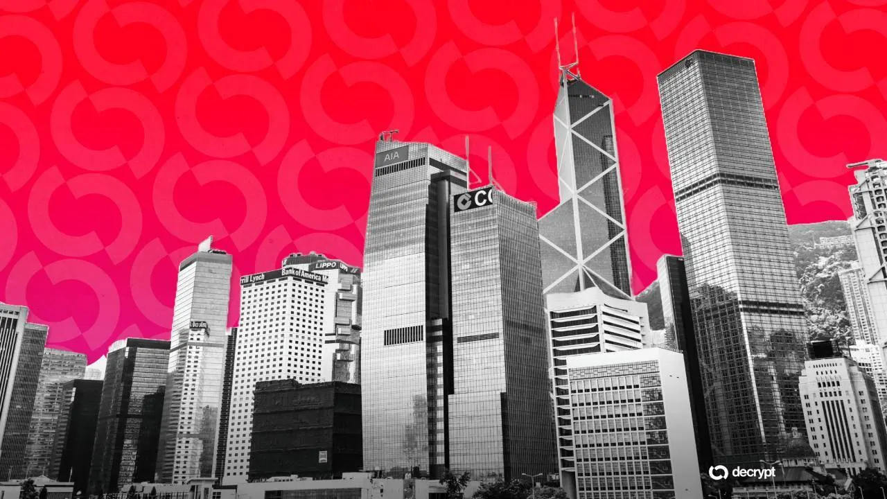 A smartphone showing a mobile payment app with a Hong Kong dollar stablecoin balance in front of the Hong Kong skyline.