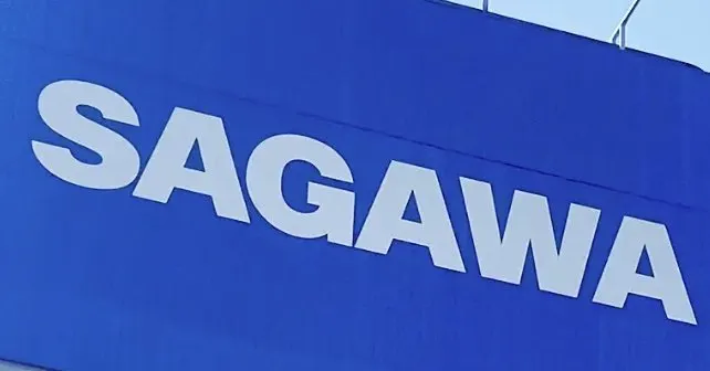 A Sagawa Express delivery truck parked beside stacked parcels, illustrating the logistics company's data breach.