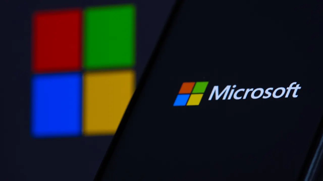 A lawyer reviewing a contract on a laptop with Microsoft Copilot suggesting tracked edits in a Word document.
