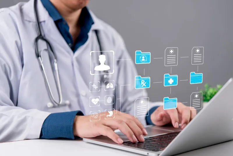 Researcher working at a laptop with a digital padlock overlay representing secure genomic health data.