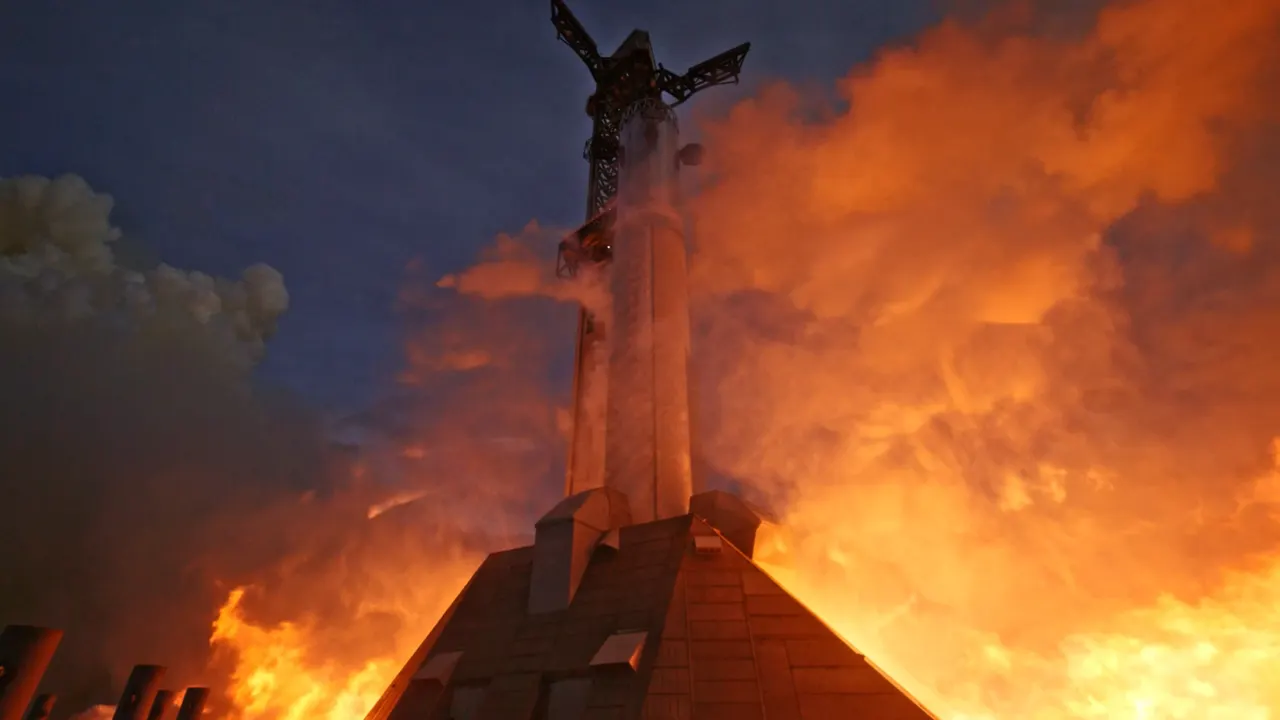 SpaceX Super Heavy booster firing its Raptor 3 engines during a static fire test at the Starbase launch site in Texas.