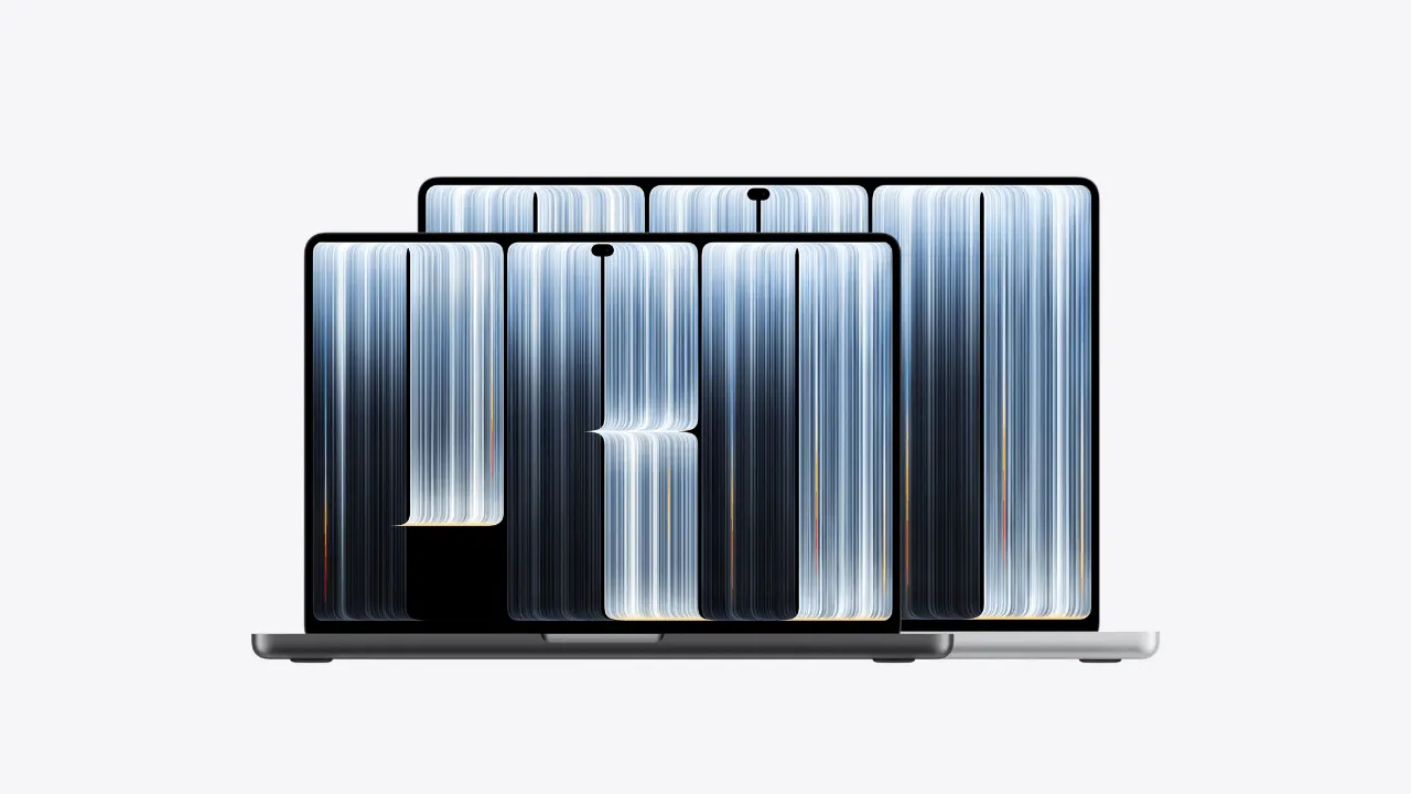 Apple's new MacBook Pro with a touchscreen tandem OLED display showing Dynamic Island at the top of the screen.