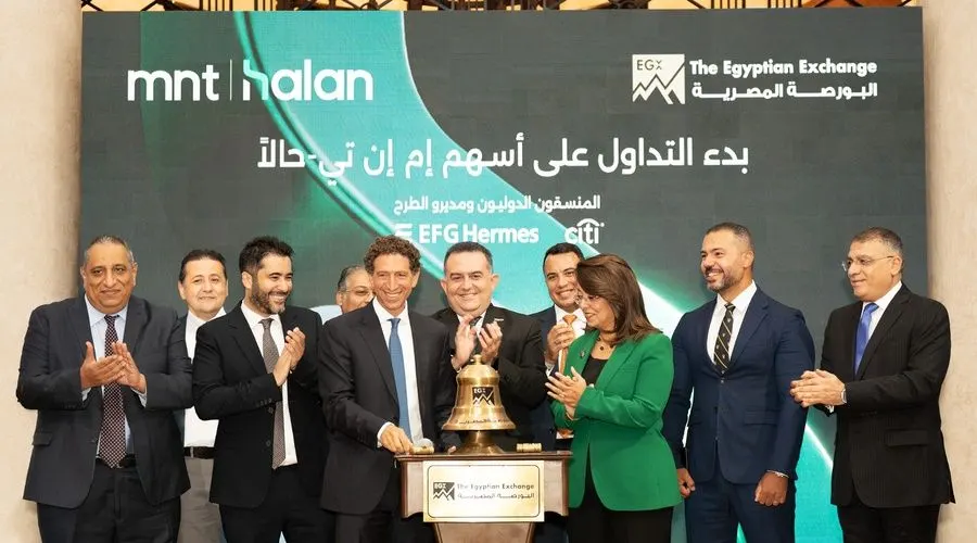 Executives and officials at a bell-ringing ceremony marking MNT-Halan's first day of trading on the Egyptian Exchange.