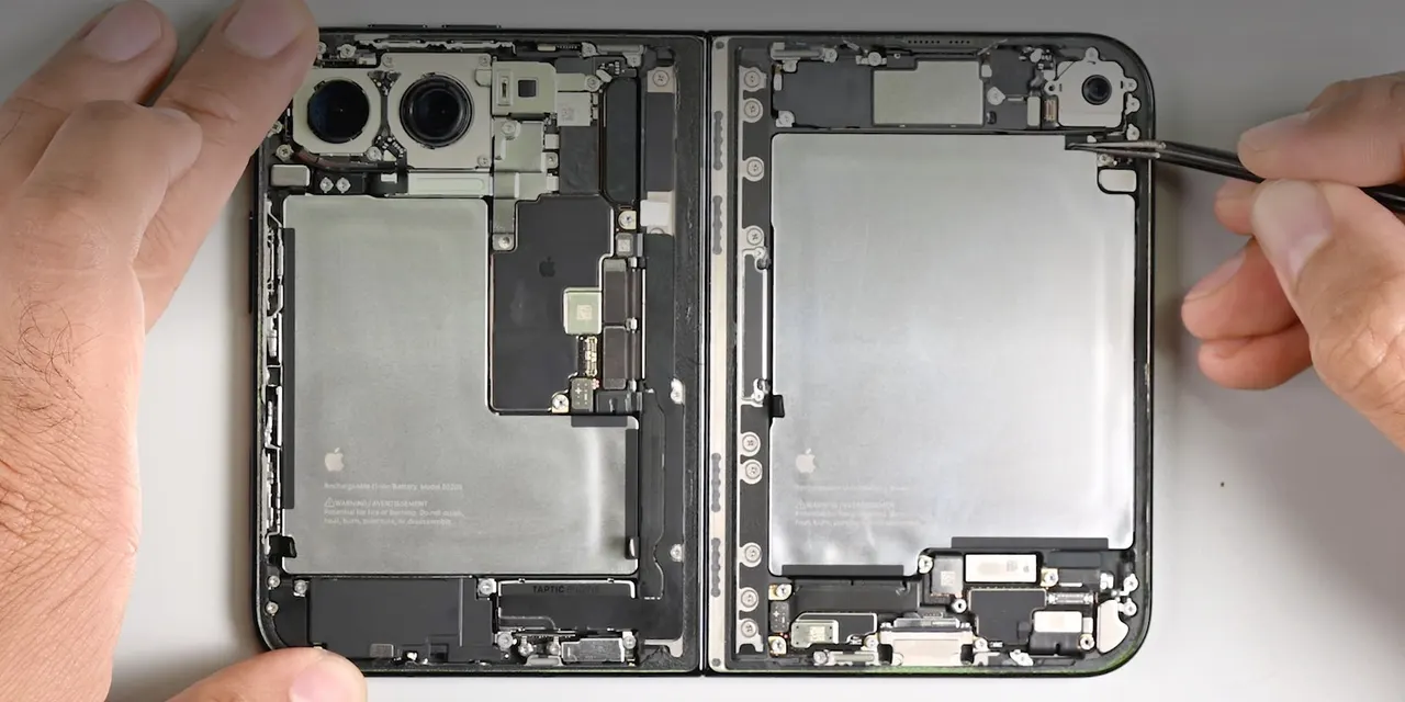 Close-up of memory chips on a circuit board, representing the RAM and flash storage shortage affecting Apple products.