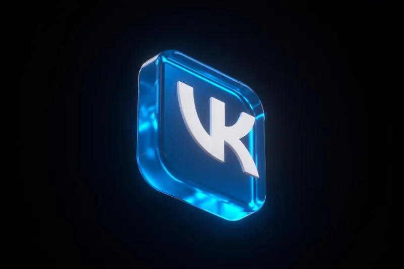Smartphone showing a messaging app interface on a desk, illustrating the Max messenger from VK.