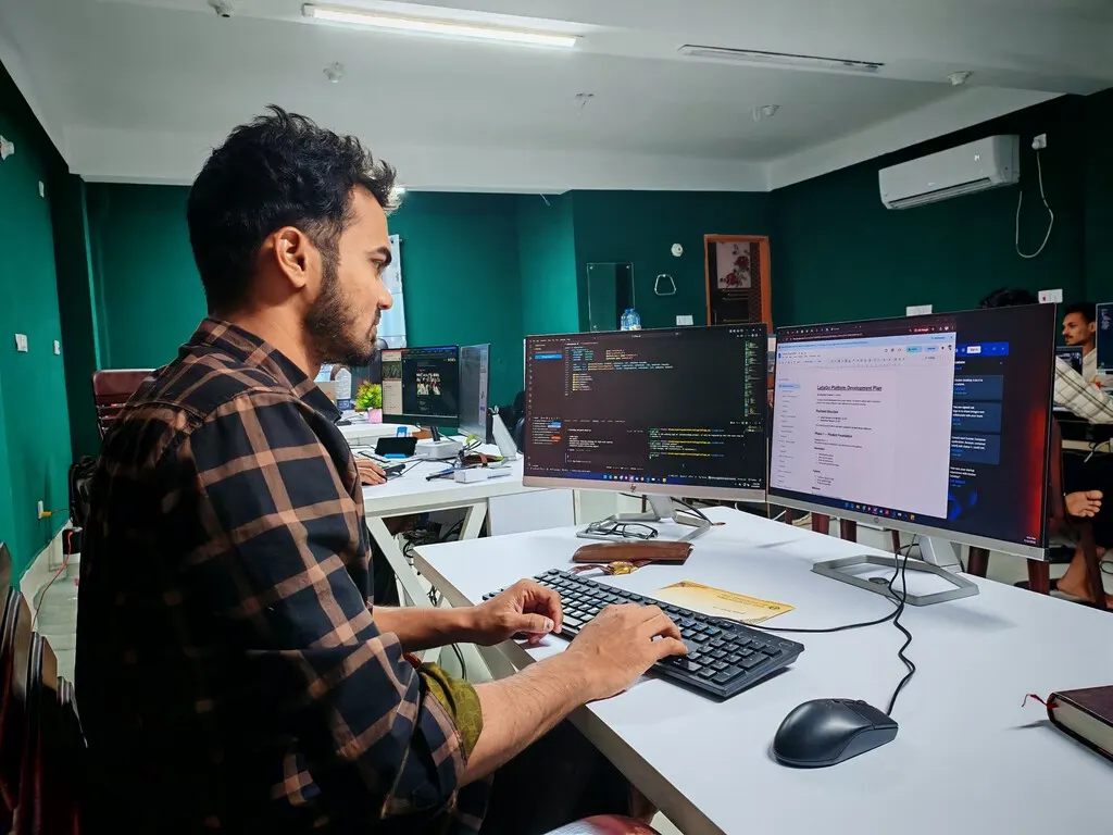 Gavel on a desk beside a laptop showing an AI interface, symbolising a court ruling on AI-related layoffs.