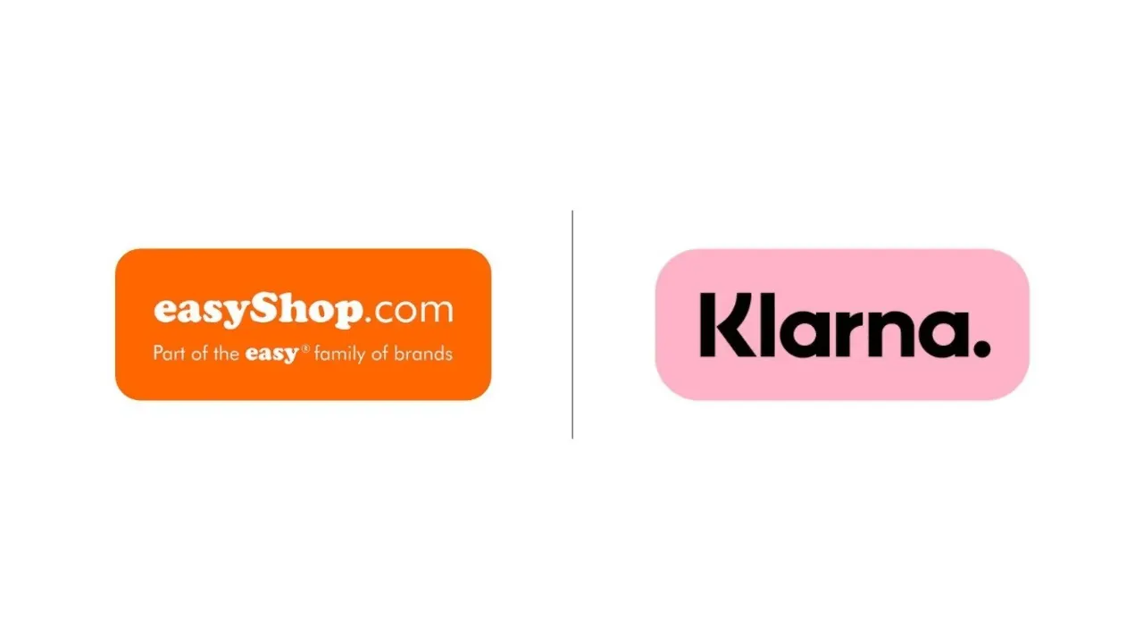 A shopper pays on a laptop at an online marketplace checkout showing Klarna pay-later options during holiday sales.