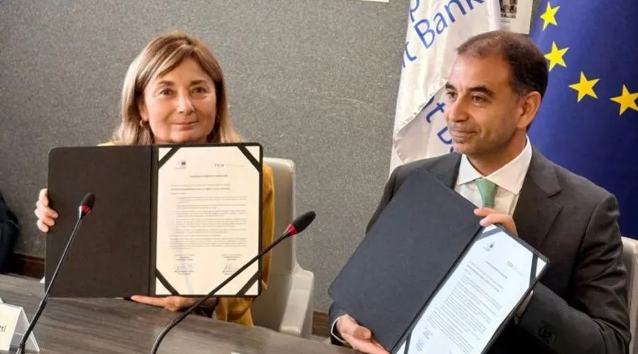 Executives and development bank officials at a ceremony in Cairo marking the close of Tanmiya Capital Fund II.