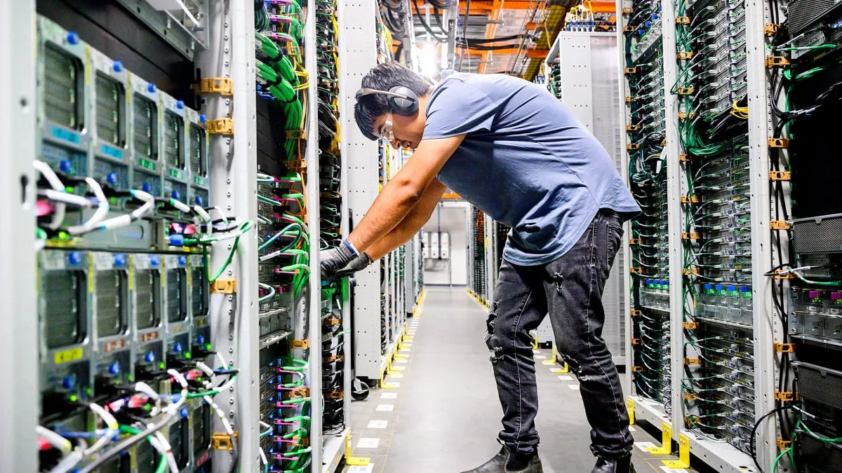 Data center server racks with blue lighting, symbolizing a sovereign cloud infrastructure in Europe.