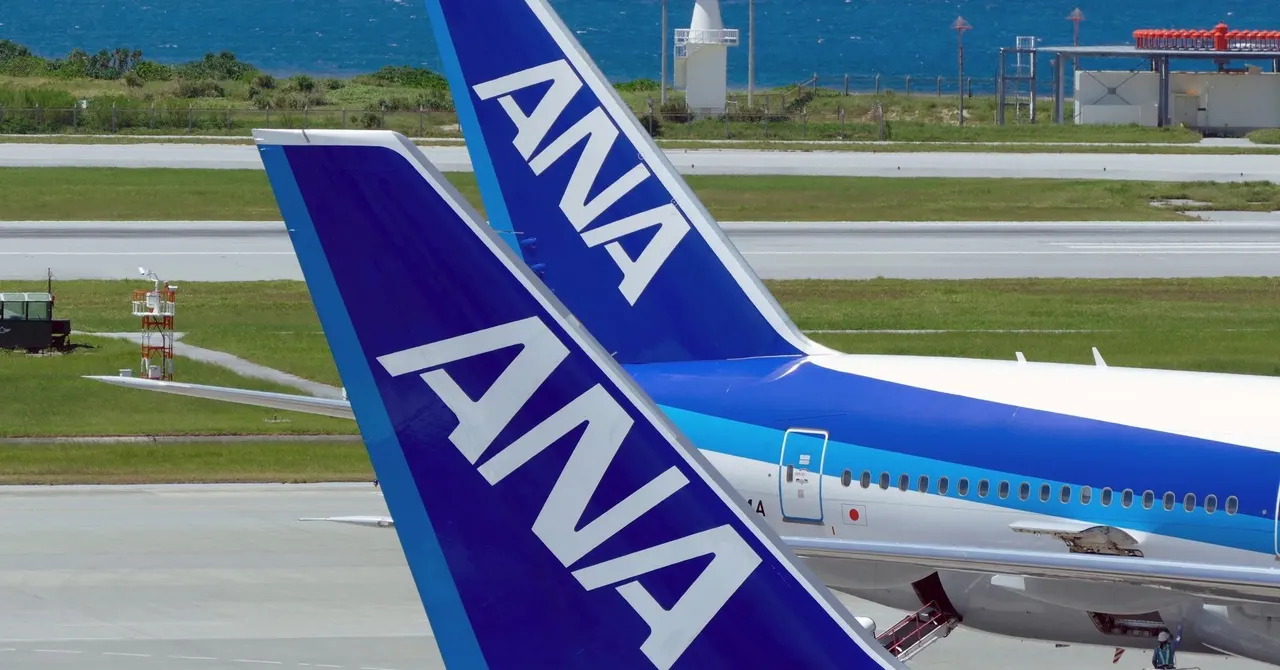 An ANA passenger aircraft on an airport apron, illustrating the airline's reservation data breach.