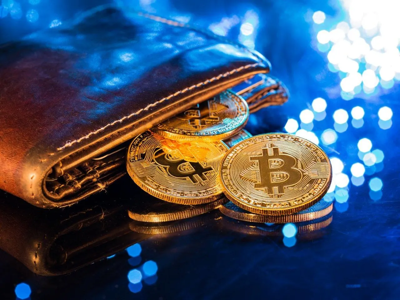 Investigators' notice board and laptop displaying cryptocurrency coins, symbolising India's crypto enforcement probe.