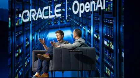 Oracle logo on a stage screen at a conference, with abstract graphics representing AI connecting to business data.