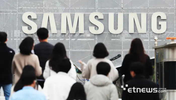Large LCD display panels on a production line in a factory, illustrating the panel supply chain behind Samsung's TCL CSOT stake purchase.