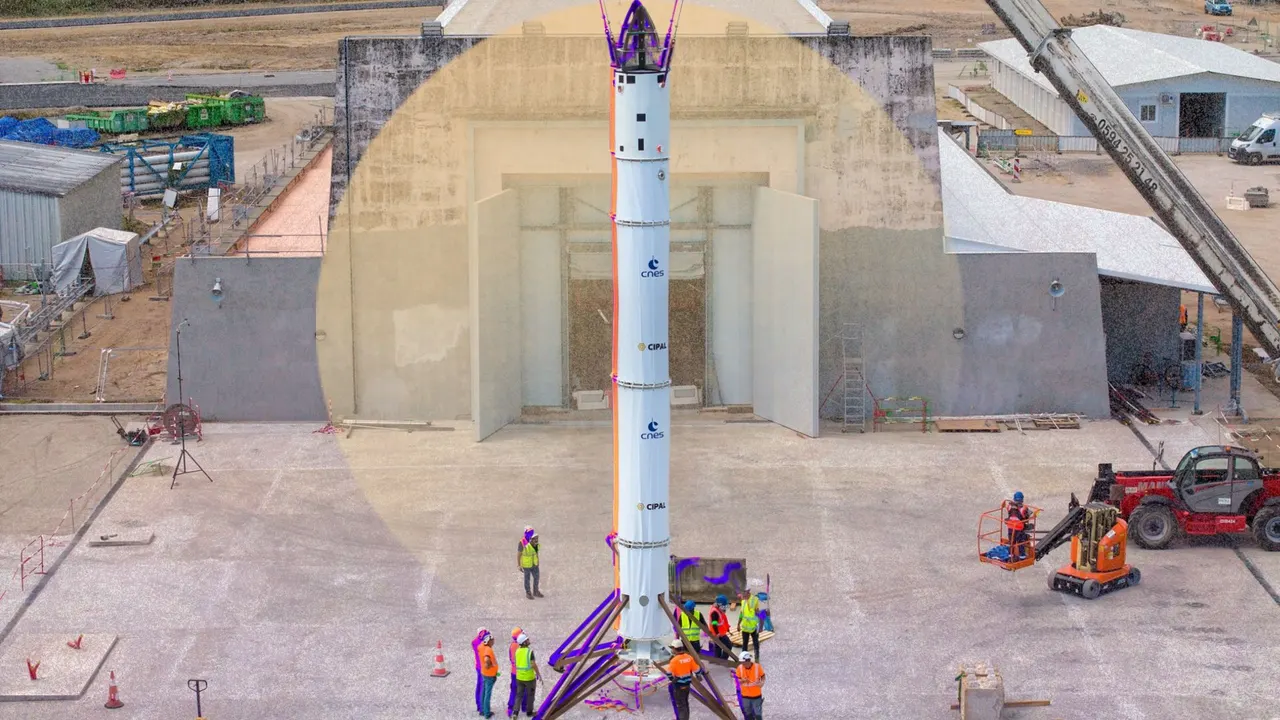 A full-scale replica of the Callisto reusable rocket demonstrator standing upright on the former Diamant launch pad at the Guiana Space Centre in Kourou.