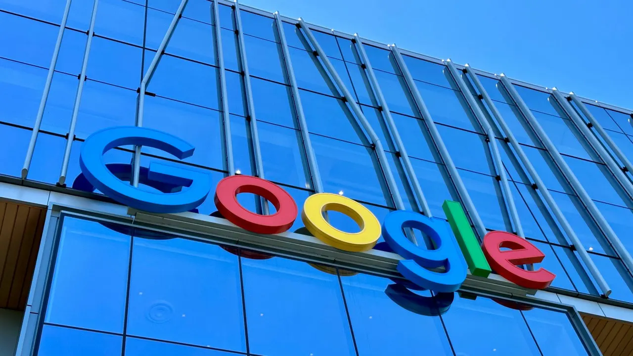 Gmail, Google Drive and Google Photos icons beside the Gemini logo on a smartphone screen, symbolizing data use for ads.