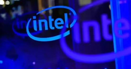 An Intel processor chip on a circuit board next to a red downward stock chart illustrating the company's sharp share price drop.